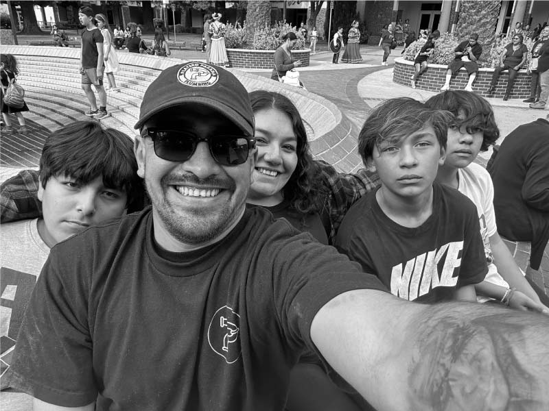 samuel platero, owner of platero parada plumbing, the best-rated near me plumber in sacramento with his family