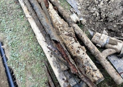 cracked and collapsed sewer pipe, showing the severity of damage requiring repair.