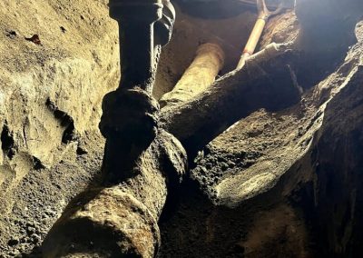 sewer pipe joint being sealed with epoxy to prevent leaks and ensure longevity