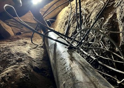 plumber using a camera for sewer line inspection to diagnose the cause of a blockage or break