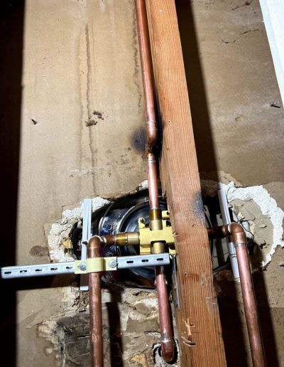 process of installing a new water line from the street to a house