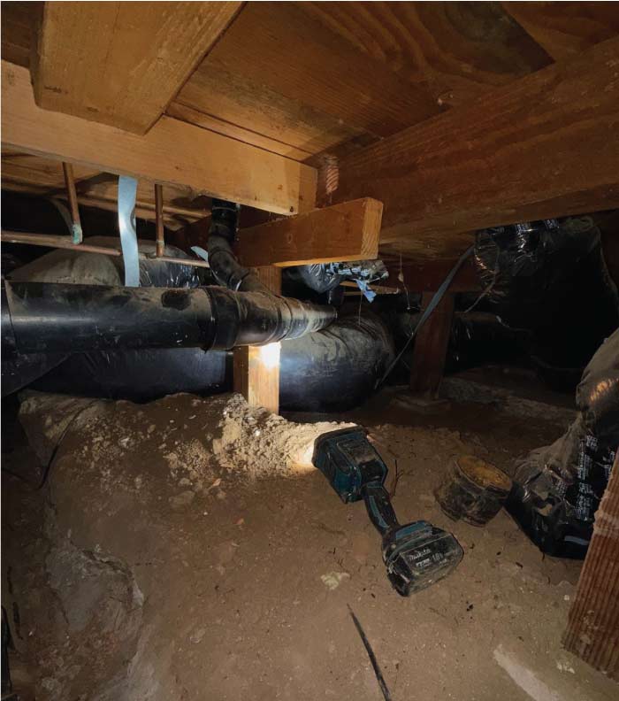 elk-grove-drain-cleaning new section of water pipe being connected to existing lines in a residential plumbing system